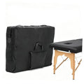 Black nylon massage table storage bag with padded carry handle and front pocket