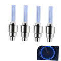Set of four LED tire valve stem caps, silver metal bases with blue glowing tubes