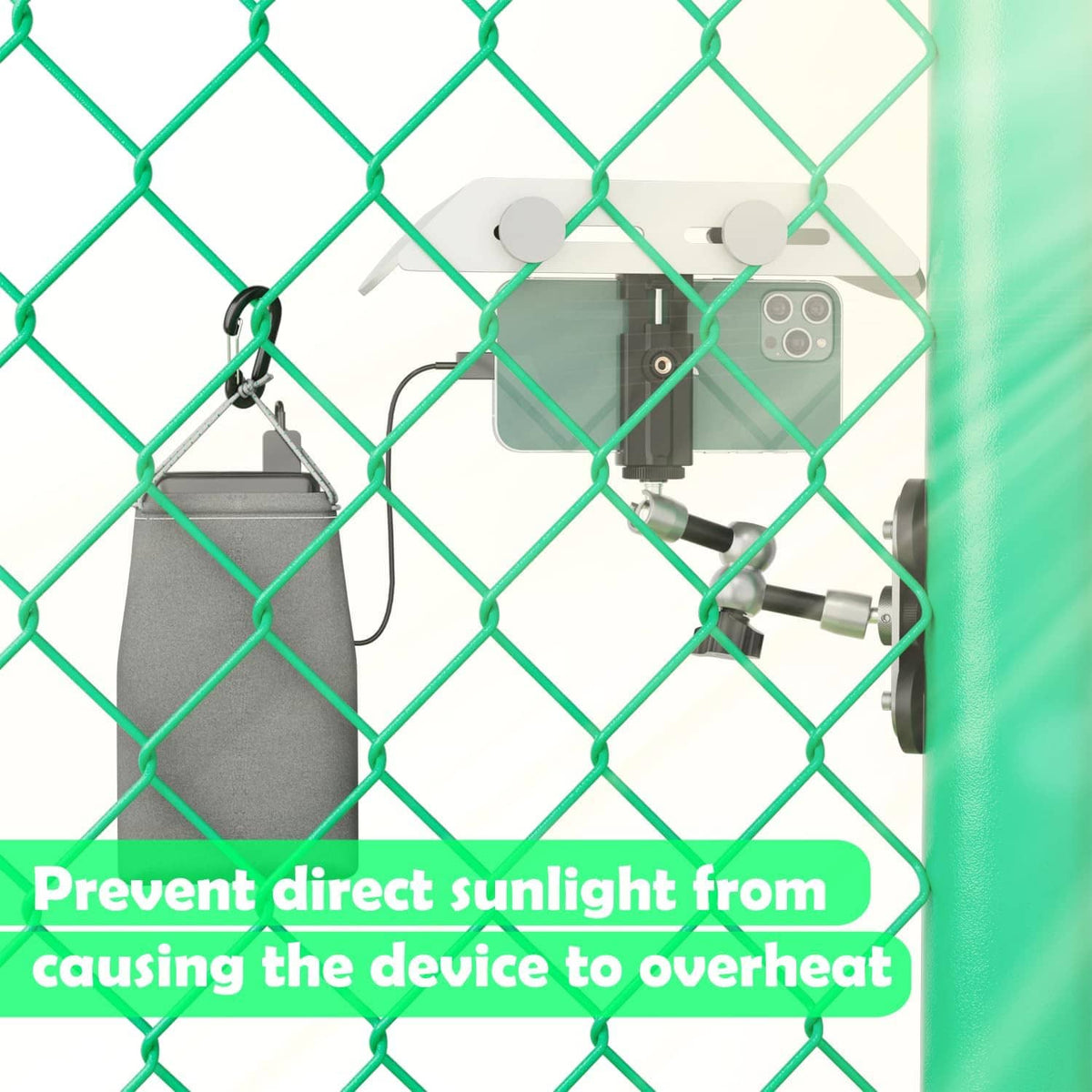 Magnetic phone fence mount with shade, phone and accessories attached to fence post