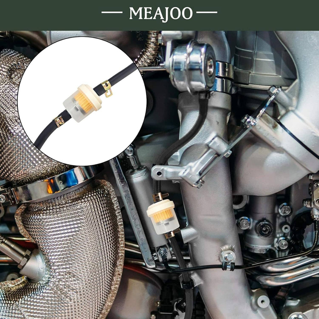Inline fuel filter installed in an engine bay on the fuel line