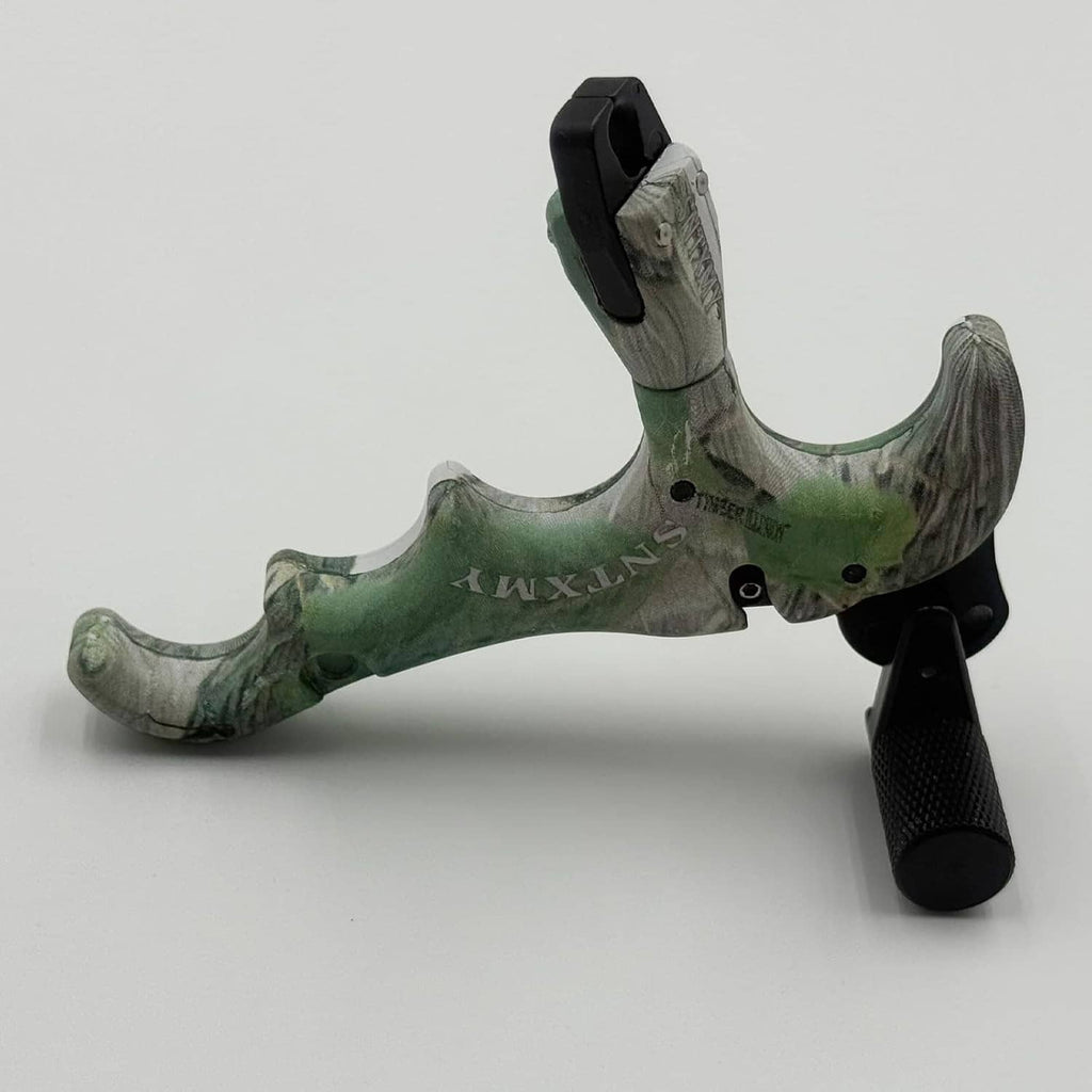 Green camo bow trigger release with black textured grip and round thumb trigger