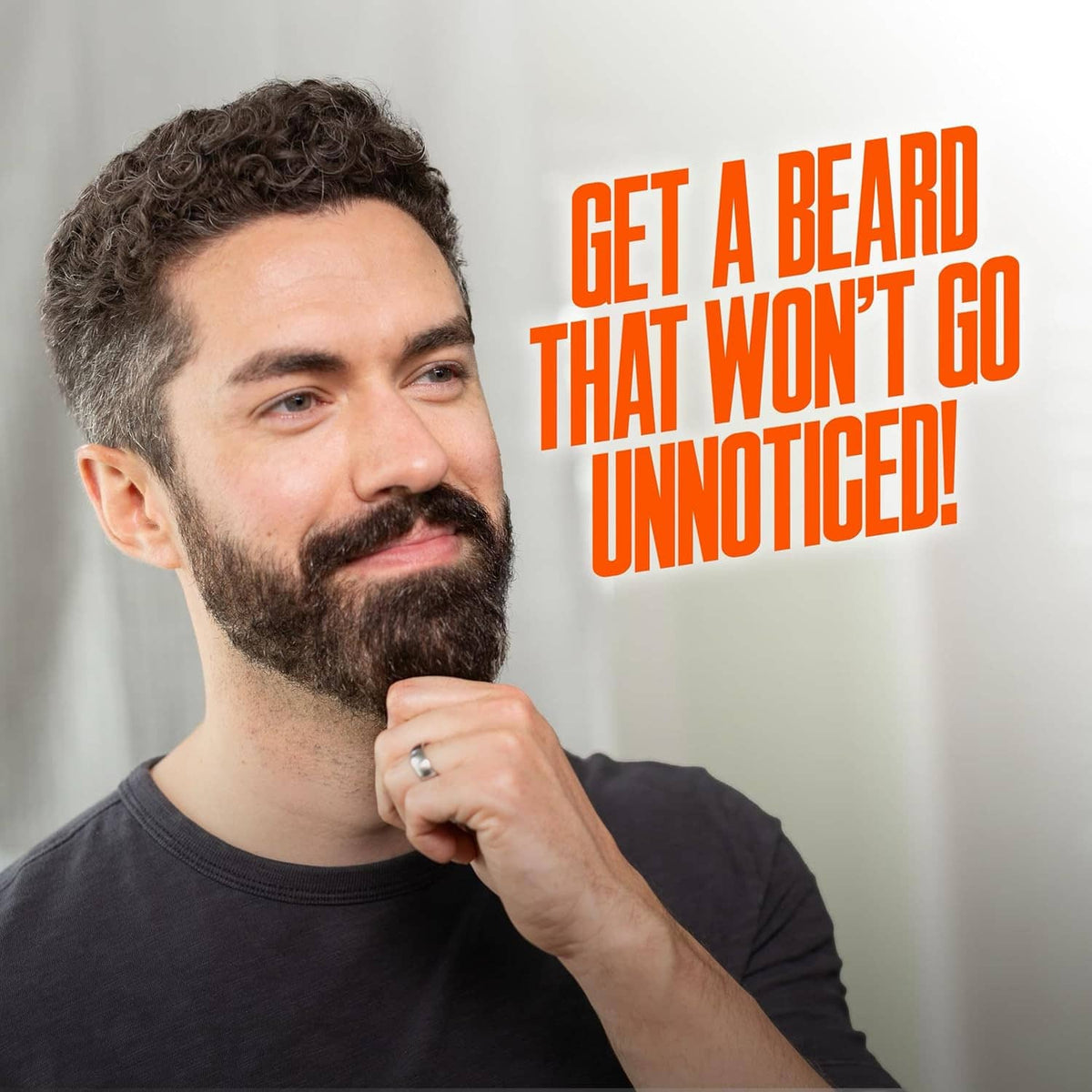 Beard growth serum ad with man holding his beard, promotional text on white background