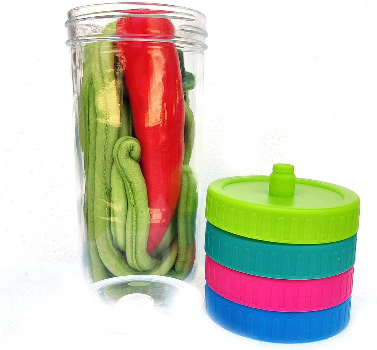 Fermentation lid for wide-mouth jars with teal and lime airlock top on a glass jar