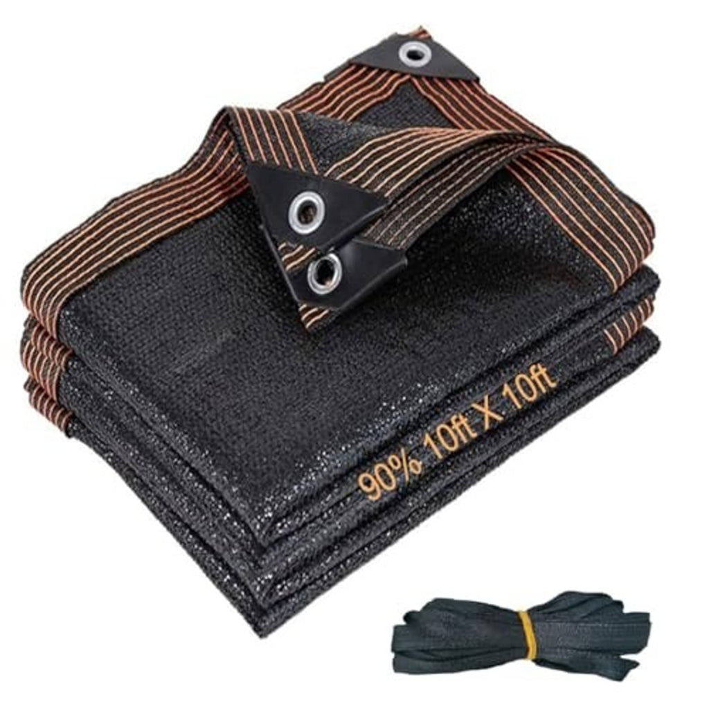 Dark shade cloth mesh tarp folded, rust pinstripe trim and grommets on black webbing