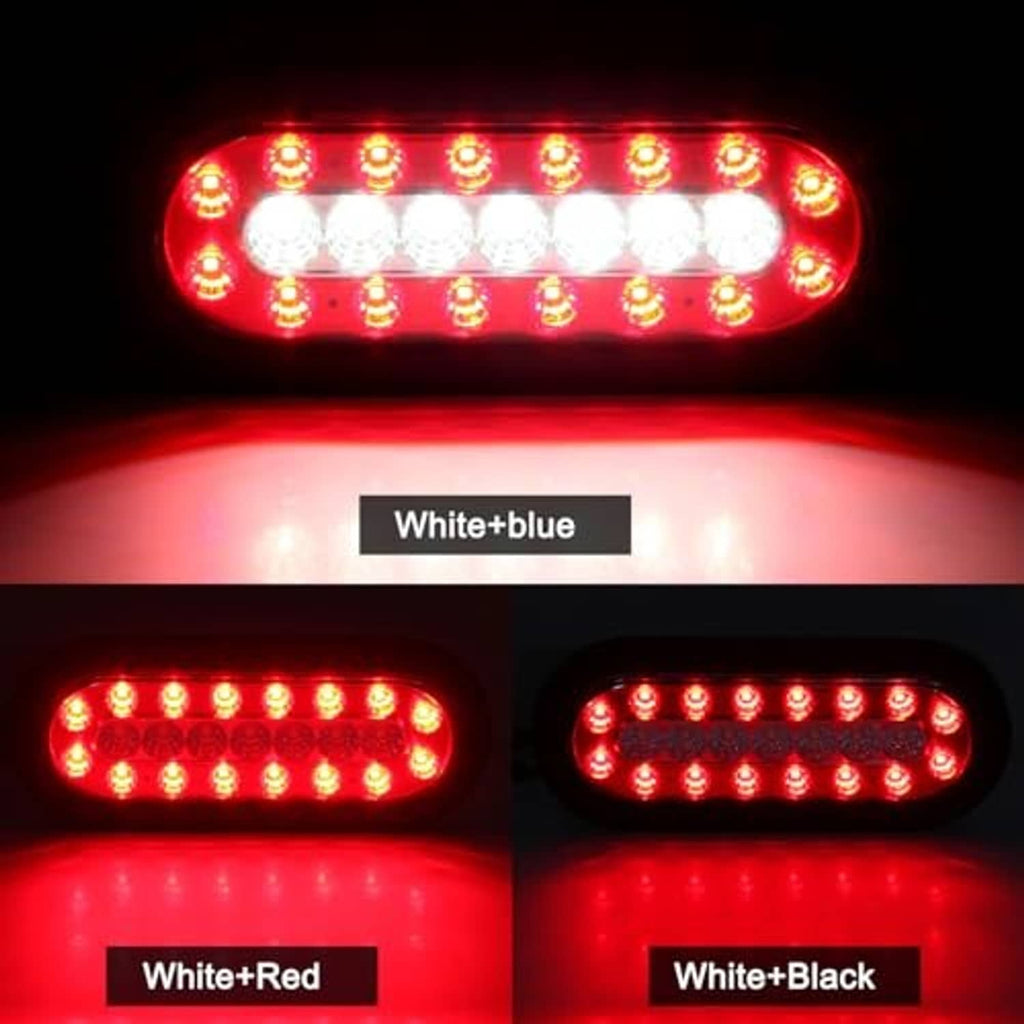 Oval LED tail lights glowing red with bright white LED rows in a single housing