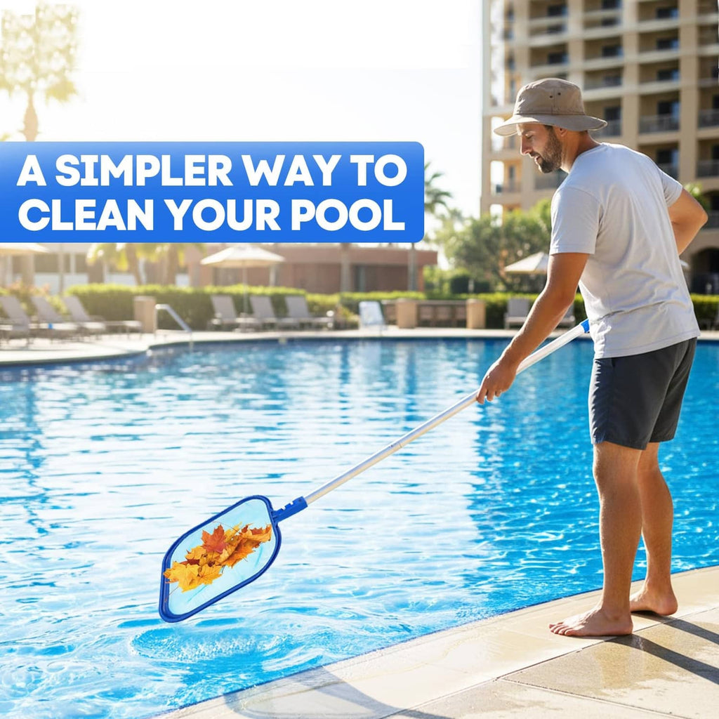 Person using a blue pool skimmer net with long pole to collect leaves