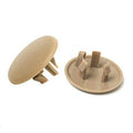 Beige armrest cover cap with oval pad and base clips, flat underside view