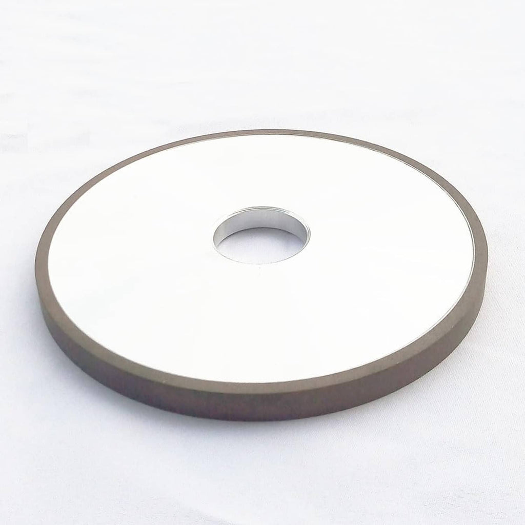 Diamond grinding wheel angled front view, 6-inch flat disc and center hole