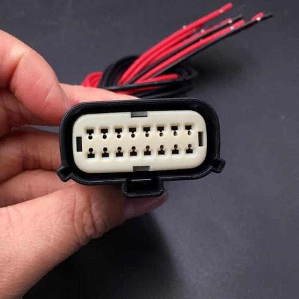 16-pin headlight connector plug with pin header detail and red wire leads