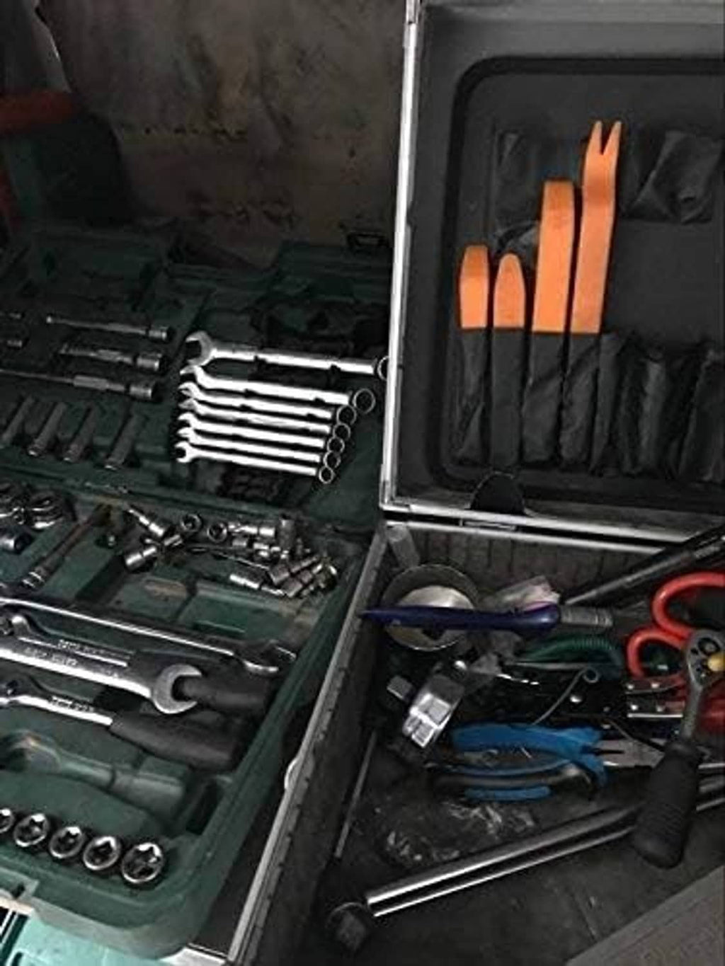 Orange trim removal tools in open case with assorted auto tools