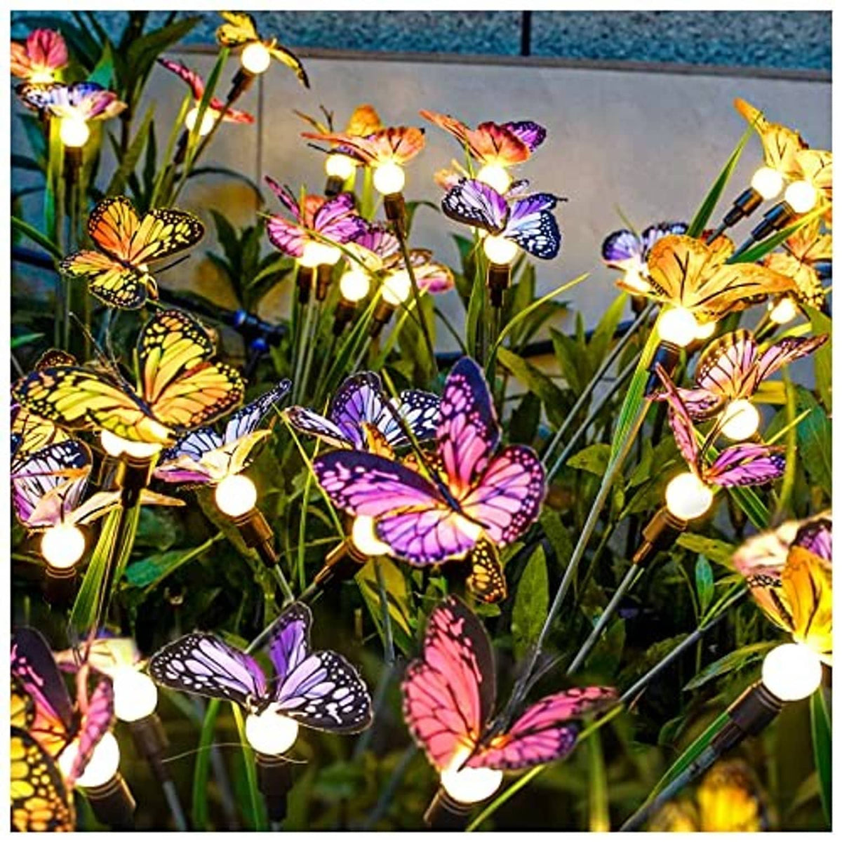 Solar butterfly garden lights: bright glowing stakes with orange, purple, pink butterfly shapes