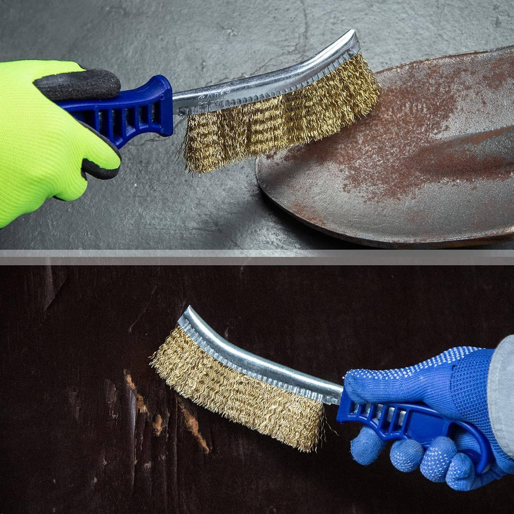 Wire brush cleaning a metal surface with gold bristles; blue handled tool in use