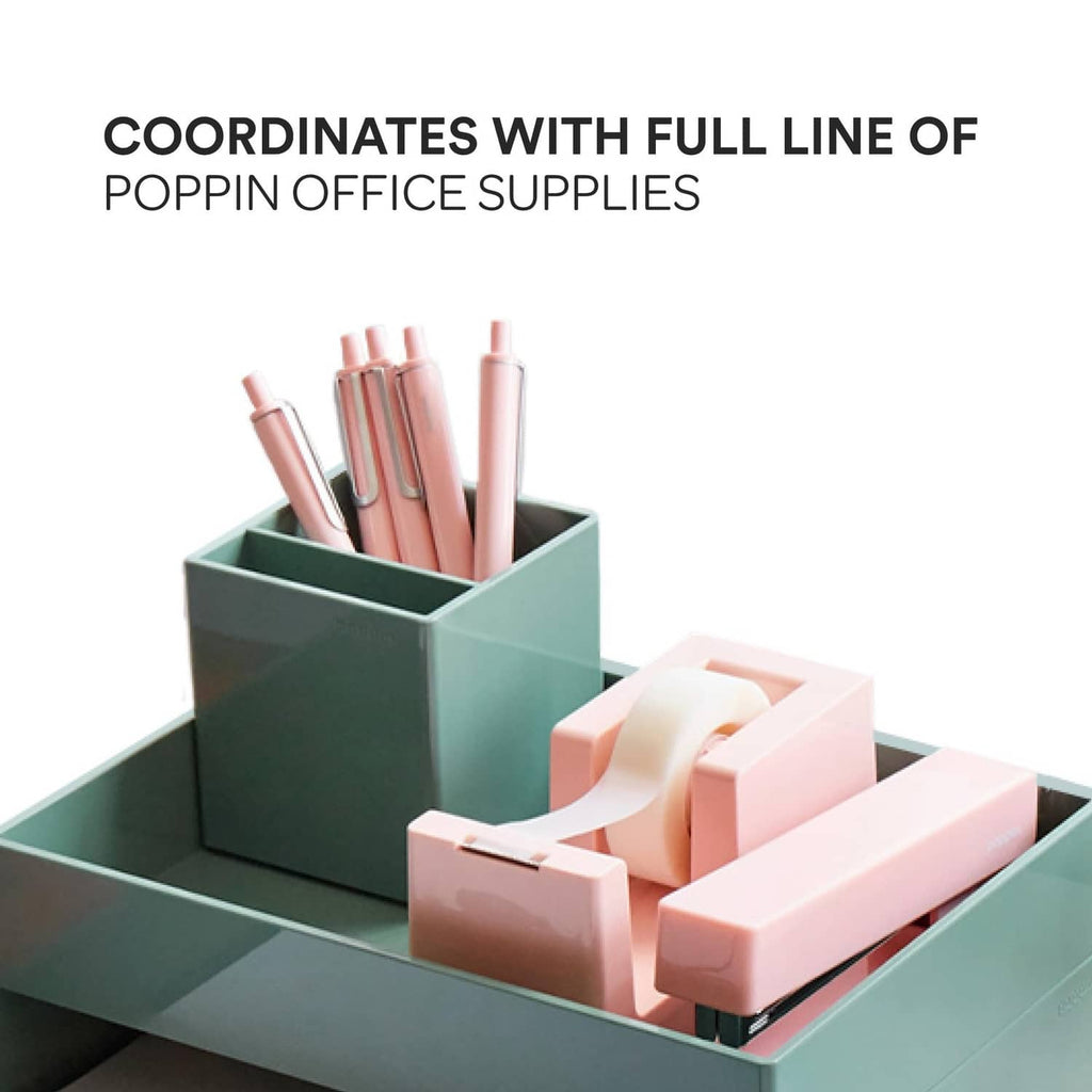 Blush pink retractable gel pens stored in a desk organizer