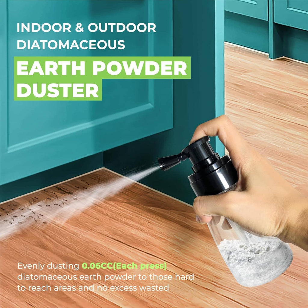 Powder duster in hand with black nozzle, dispensing white powder on wooden floor