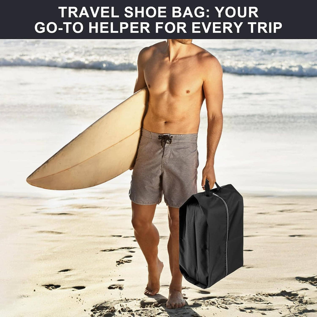 Man carrying a black shoe storage bag with top handle at the beach