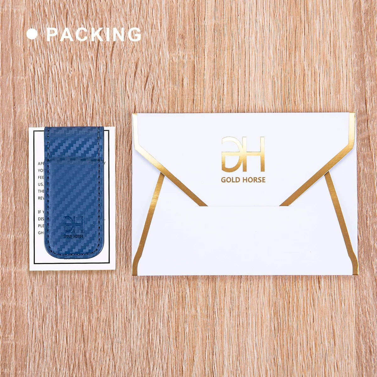 Blue leather card holder shown with branded envelope and packing card