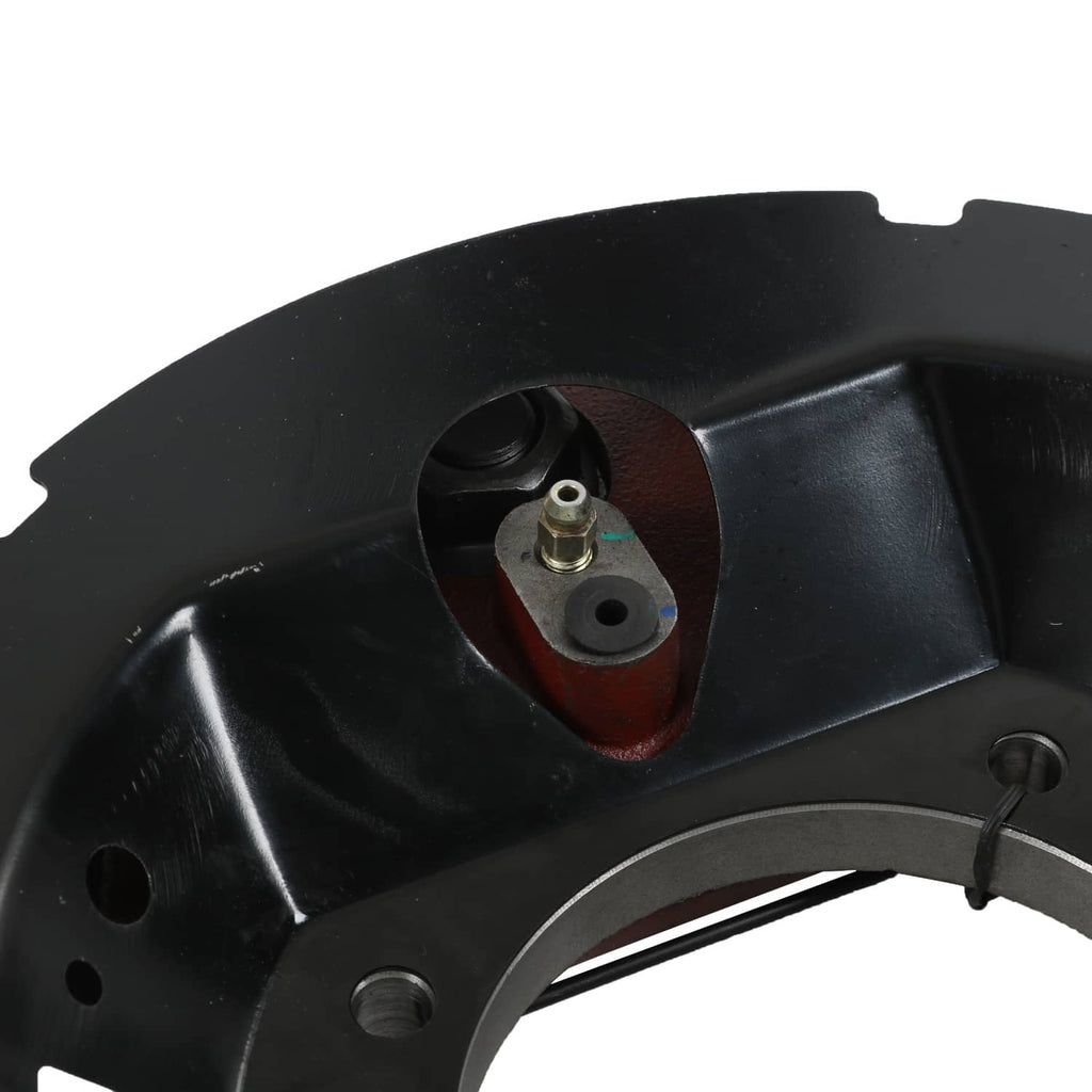 Hydraulic trailer brake actuator area with black housing and red backing pad