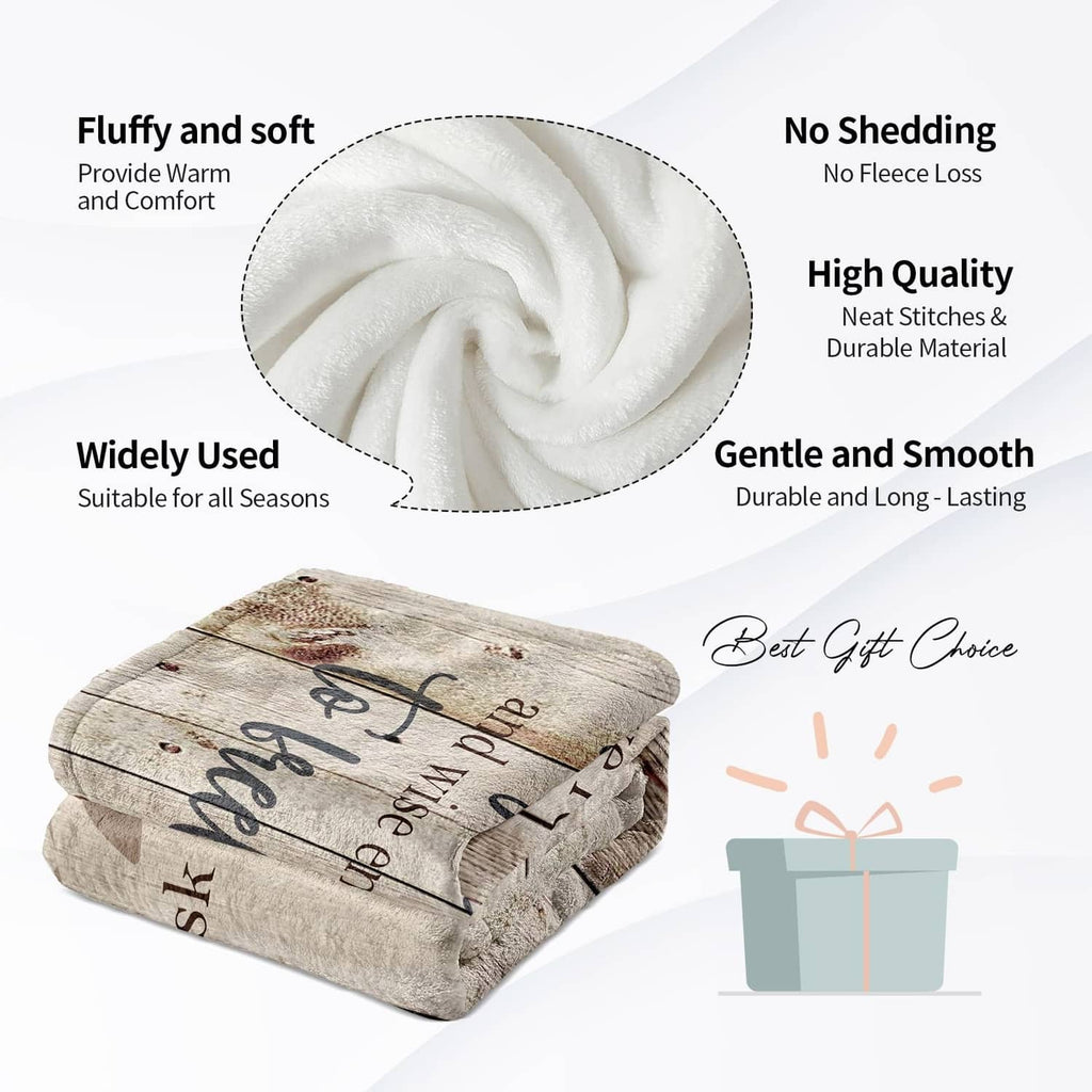 Folded beige marriage prayer throw blanket with icons for softness and no-shedding
