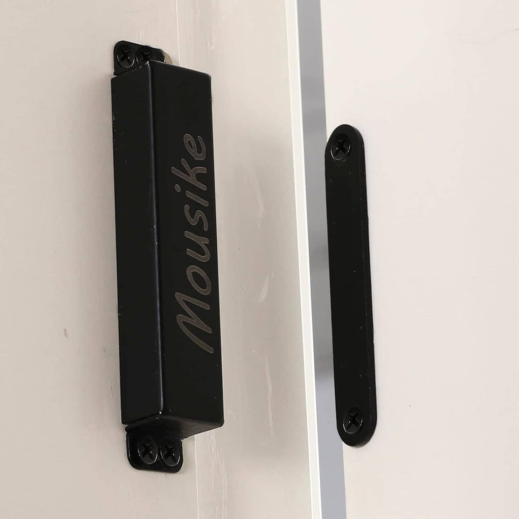 Black magnetic door catch installed on door edge with screw-mounted latch bar