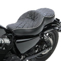 Two-up motorcycle seat cushion with black quilted pattern and light piping