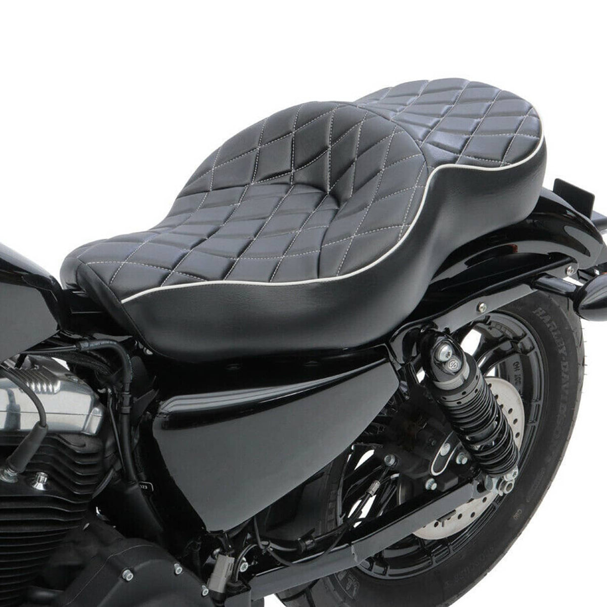 Two-up motorcycle seat cushion with black quilted pattern and light piping