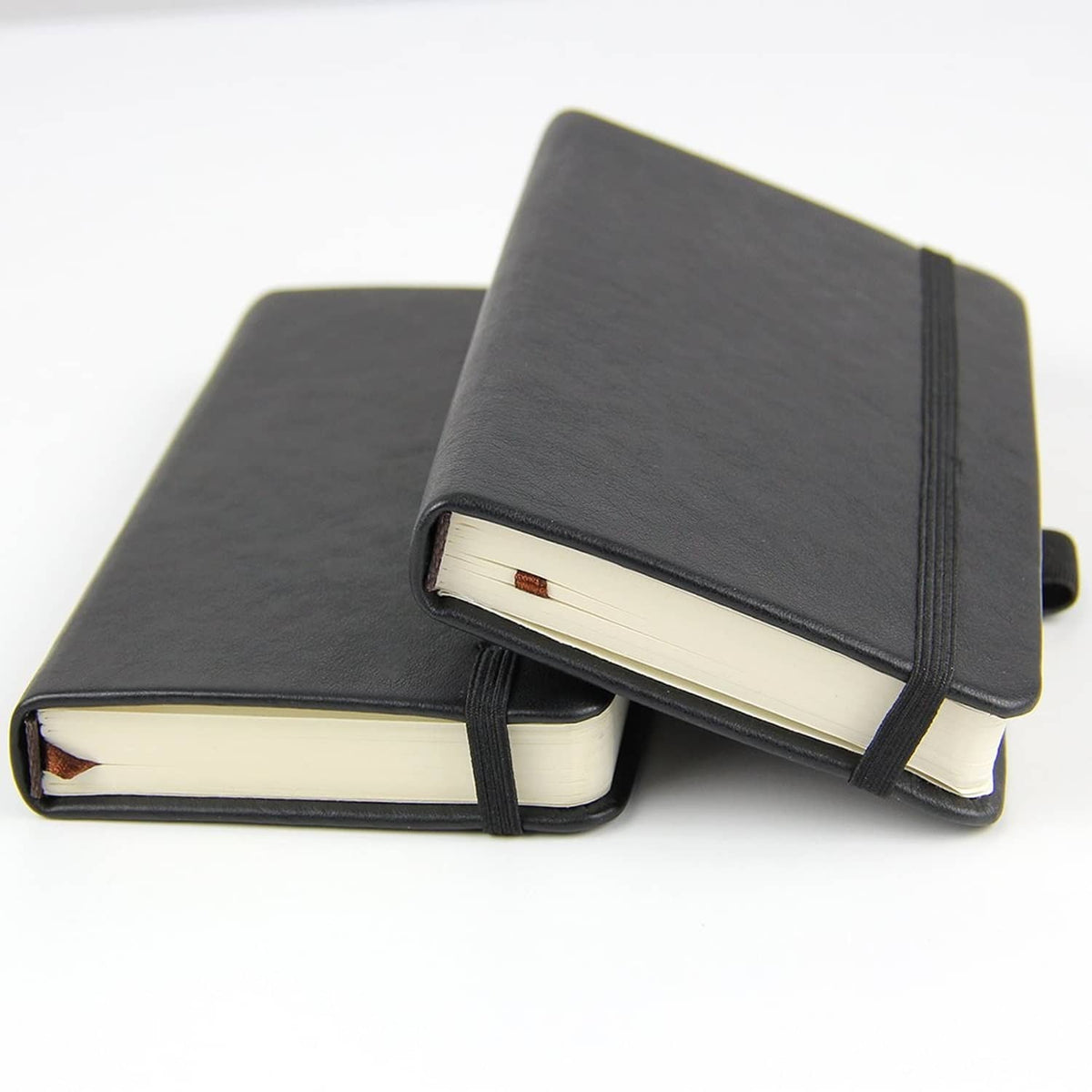 Newestor 2-pack pocket notebooks with dark covers, elastic strap, and cream pages