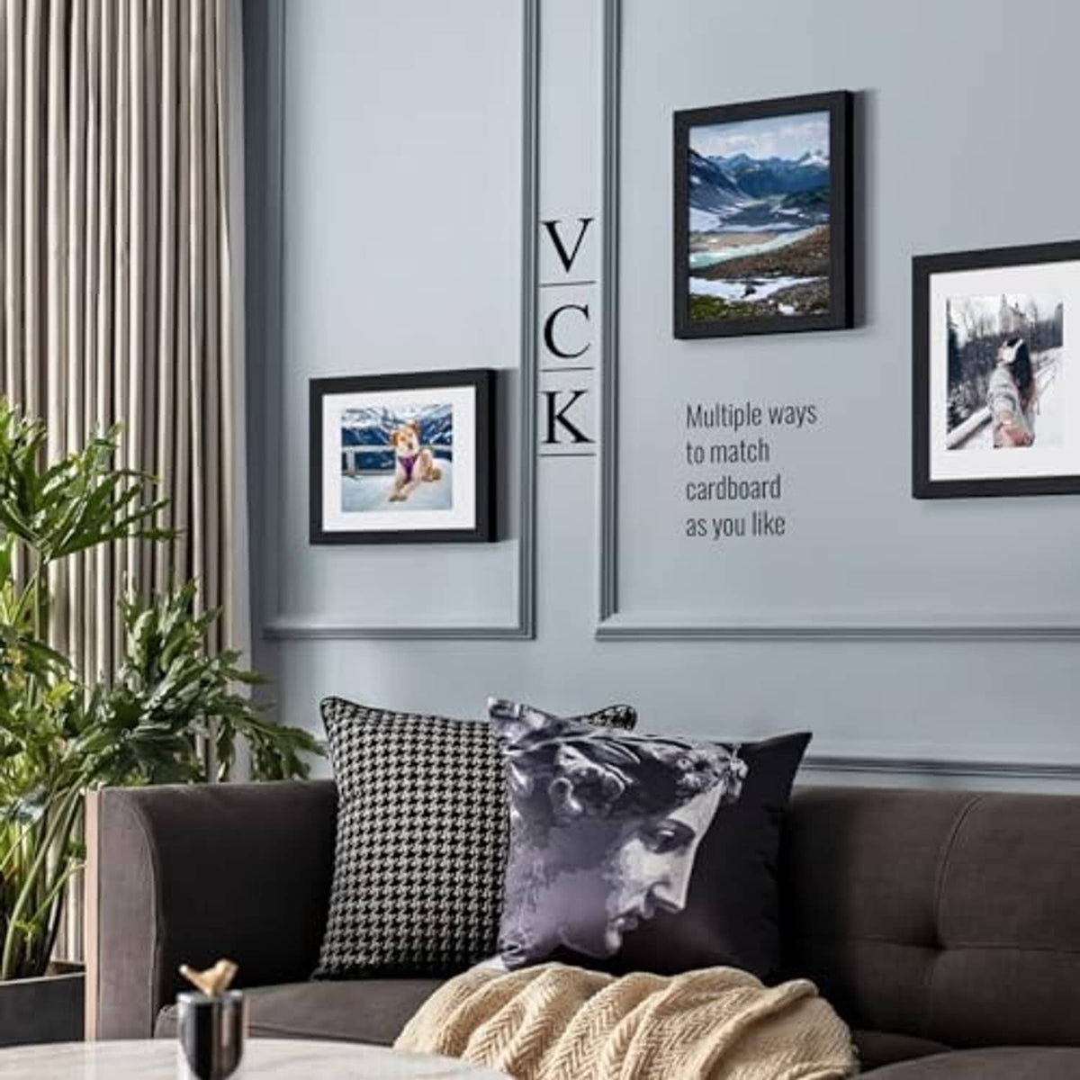 Black oak wall-hanging picture frames with real glass, shown with framed photos.