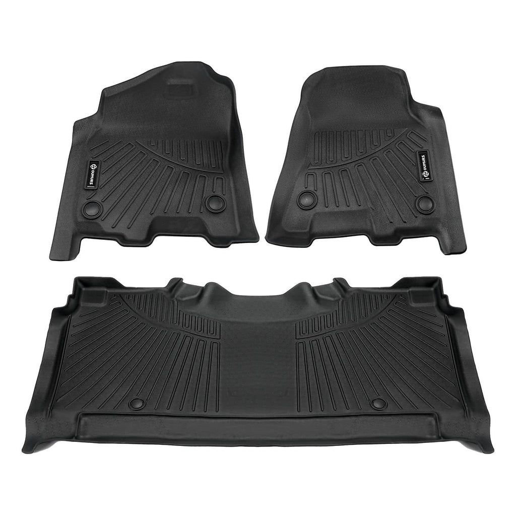 Black TPE front floor mats with molded channels, circular grommets, and brand labels