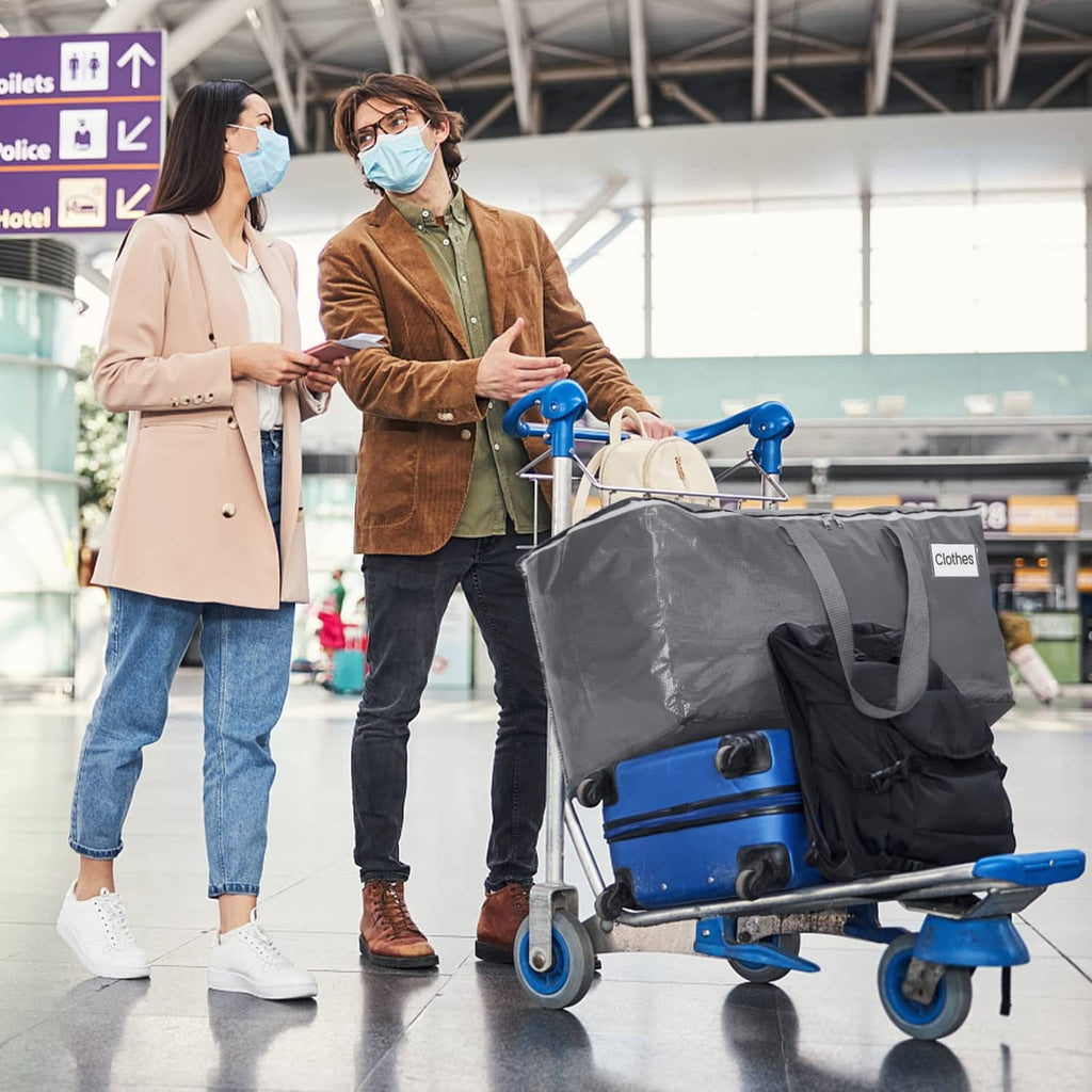 Gray large moving storage bag with handles, shown on a wheeled cart