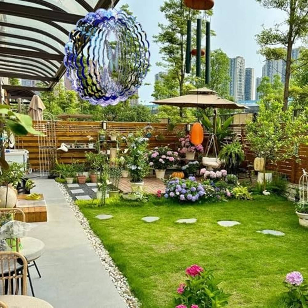 Outdoor hanging butterfly wind spinner with blue and silver layered circular blades