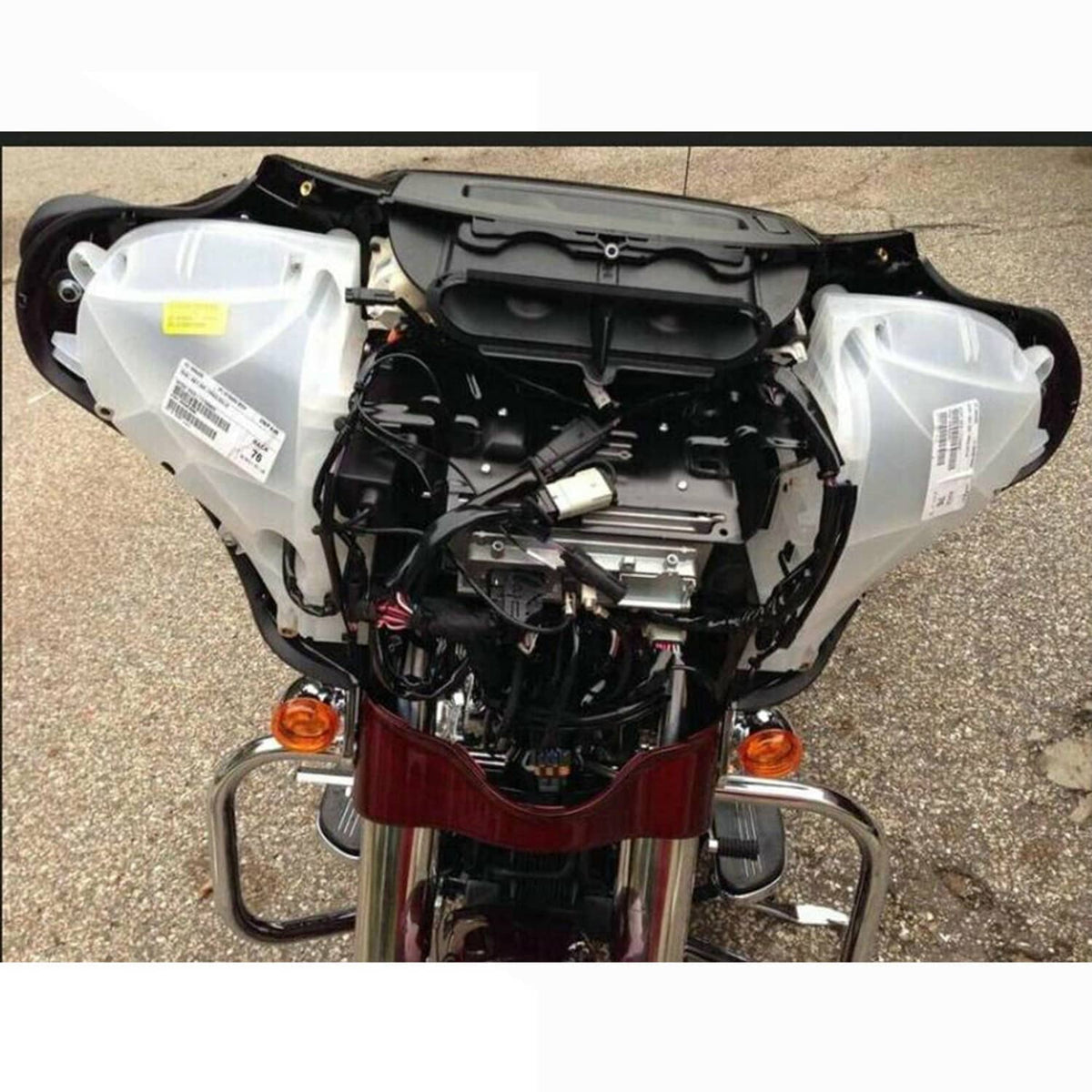 Installed inner fairing speaker covers, white plastic shields with oval grille openings