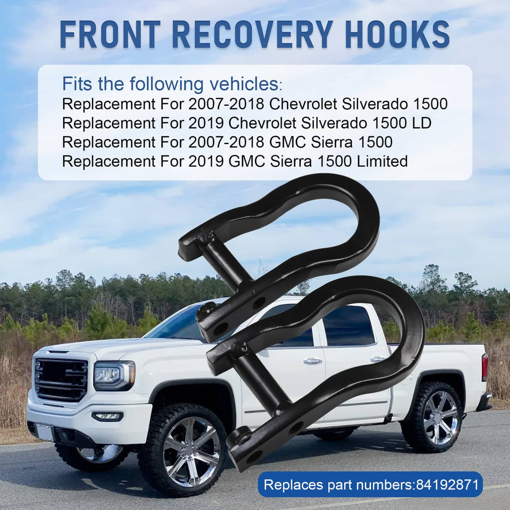 Black front recovery tow hooks mounted on pickup grille area