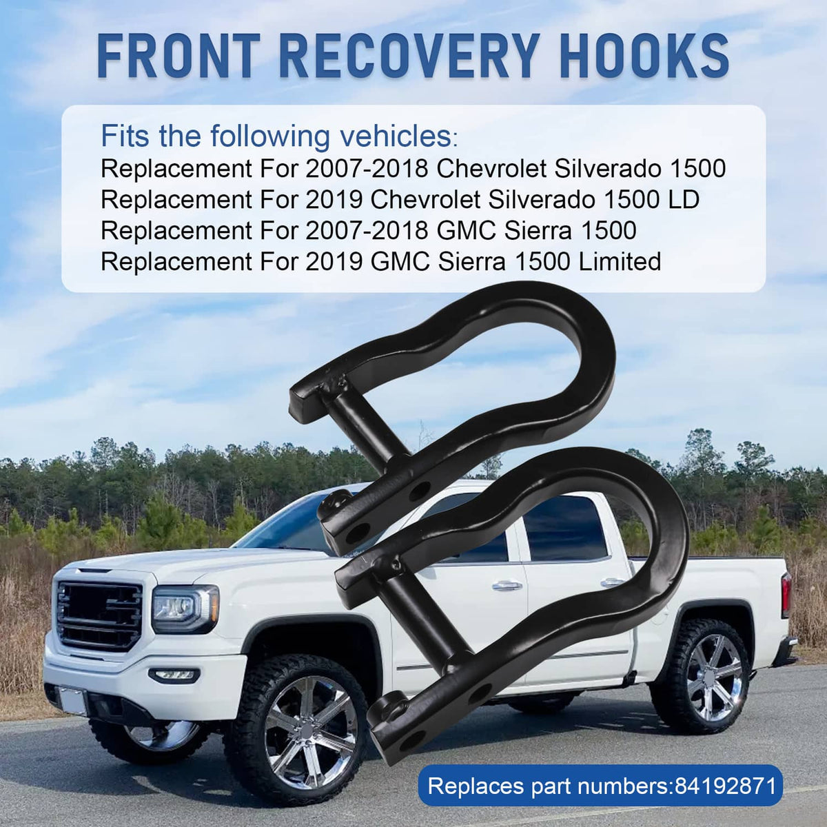 Black front recovery tow hooks mounted on pickup grille area