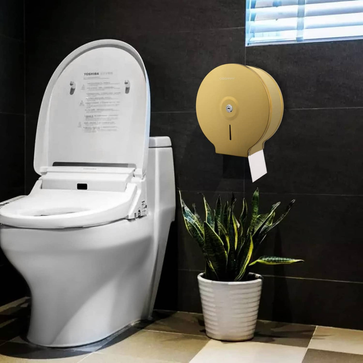 Gold toilet tissue dispenser with mounted roll and outlet slot