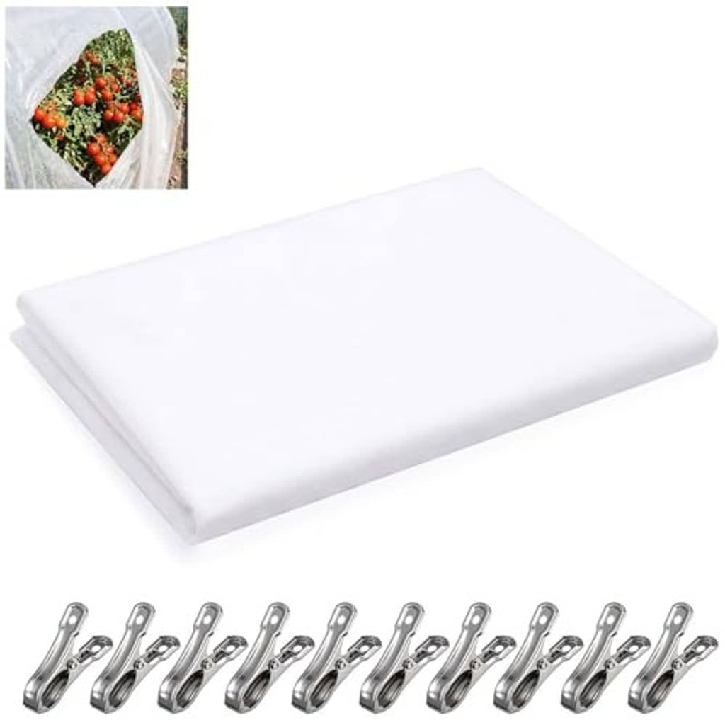 White non-woven plant cover cloth with multiple metal spring clips, folded