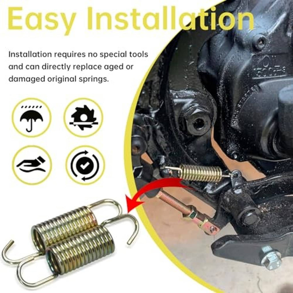 Installed rear brake pedal return spring pair with coiled steel and U-shaped hooks