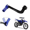 Motorcycle folding gear shifter lever with blue knurled tip and black CNC body
