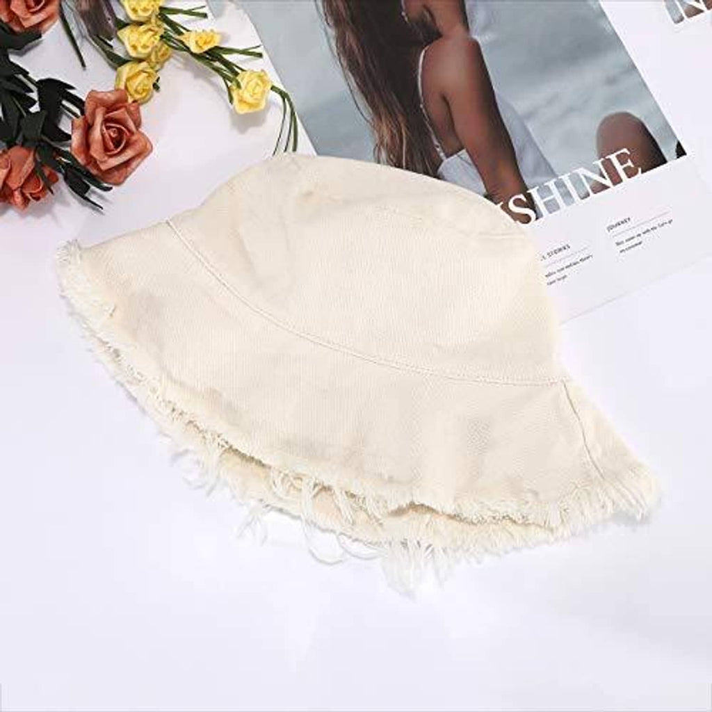 Cream cotton bucket hat, wide brim, with frayed trim and seam paneling