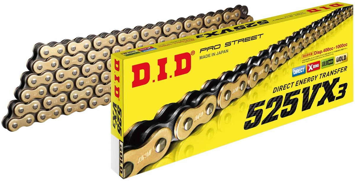Gold and black roller motorcycle chain with interlocking links in a retail box