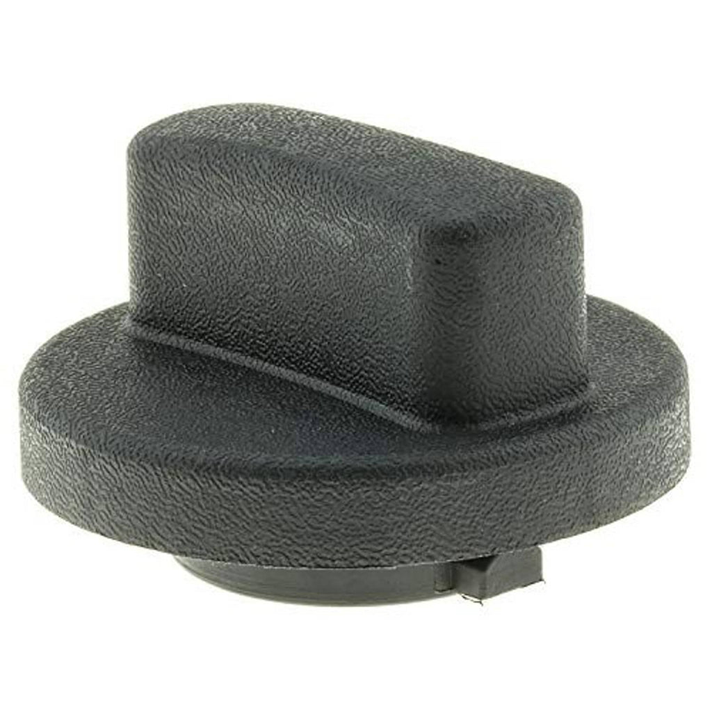 Dark fuel tank cap with textured domed top and visible seam and tabs