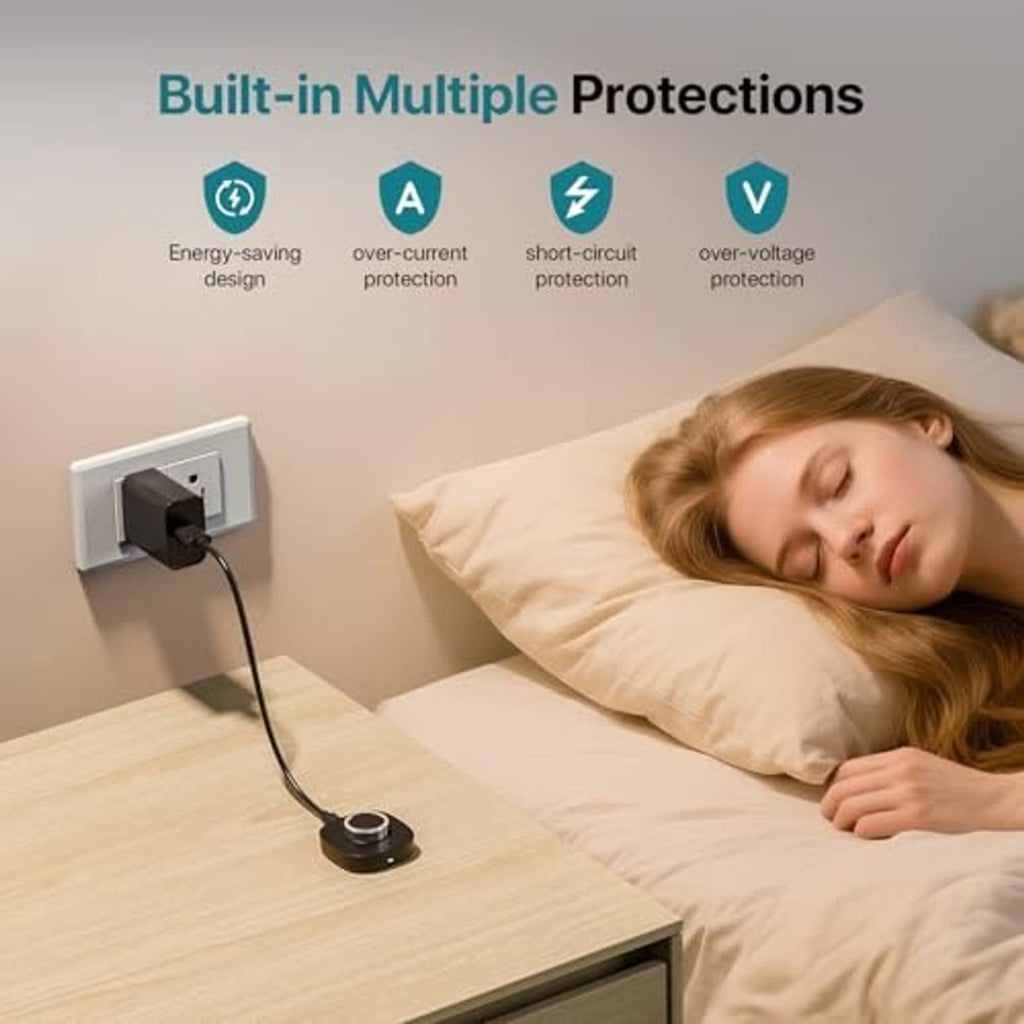 Black charging dock connected to a USB cable near a wall outlet