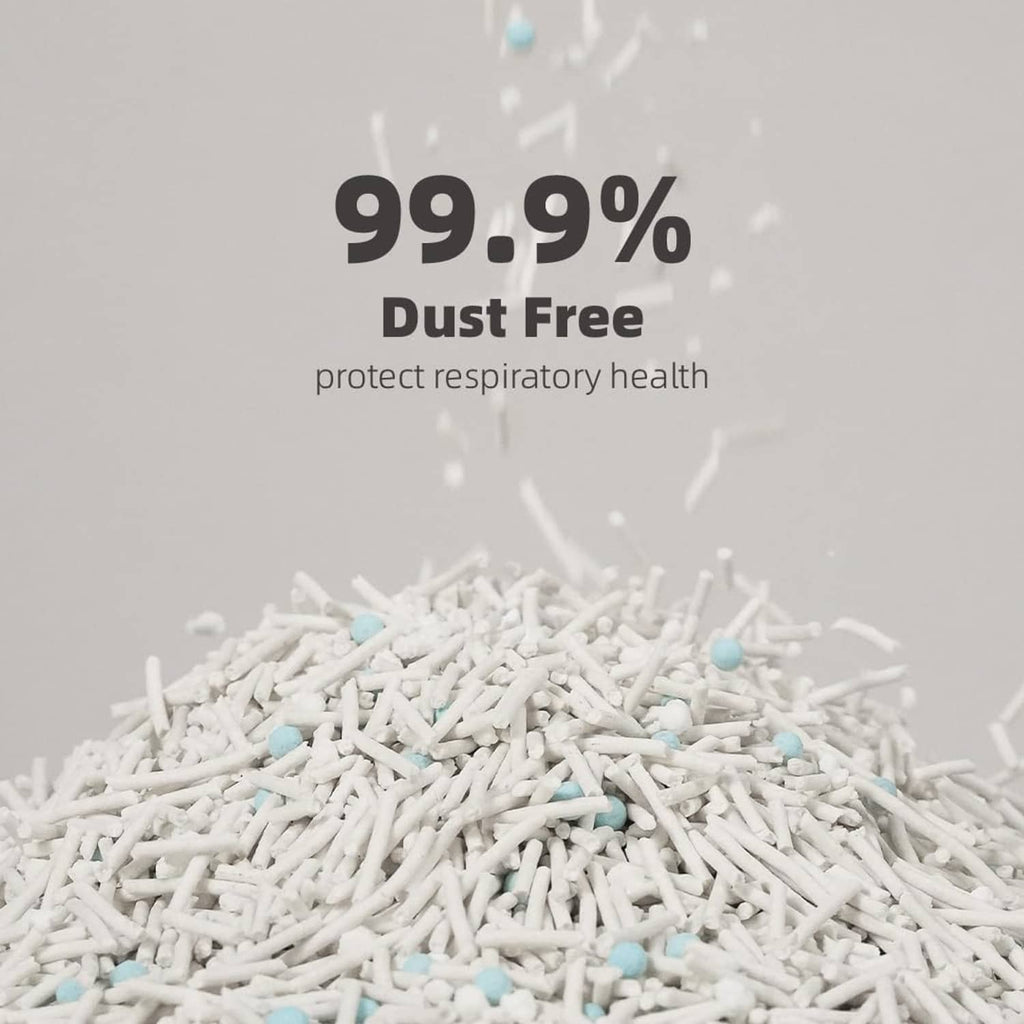 White cat litter pellets with small blue specks in a dust-free pile