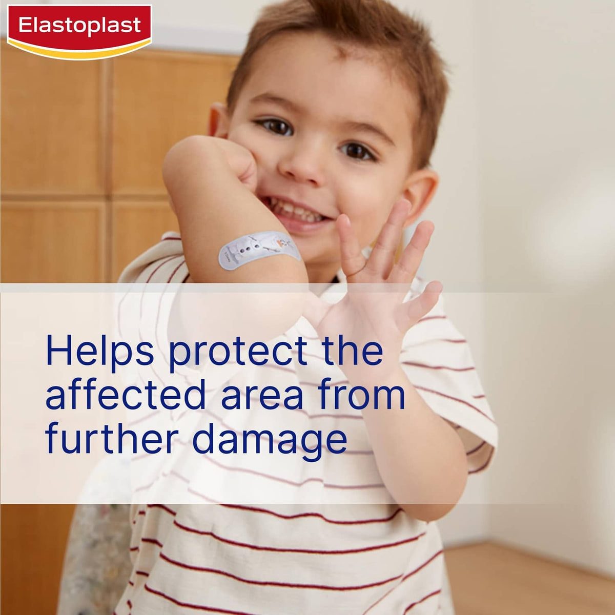 Elastoplast Frozen kids plaster on child's arm to help protect from further damage