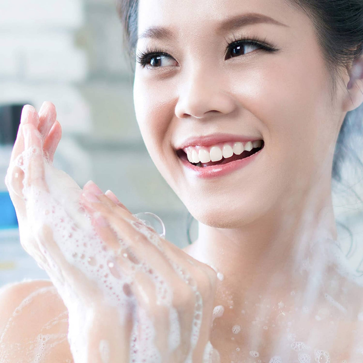 Dial antibacterial bar soap, woman washing with rich foam on hands