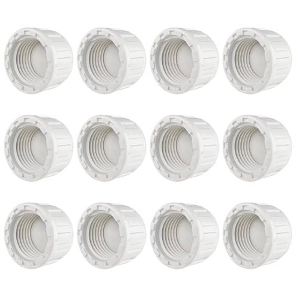 Set of 12 white PVC sprinkler end caps, multiple caps shown front-facing