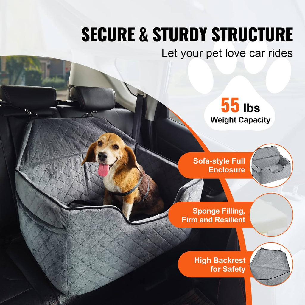 Gray pet booster car seat secured on car back seat with dog sitting inside