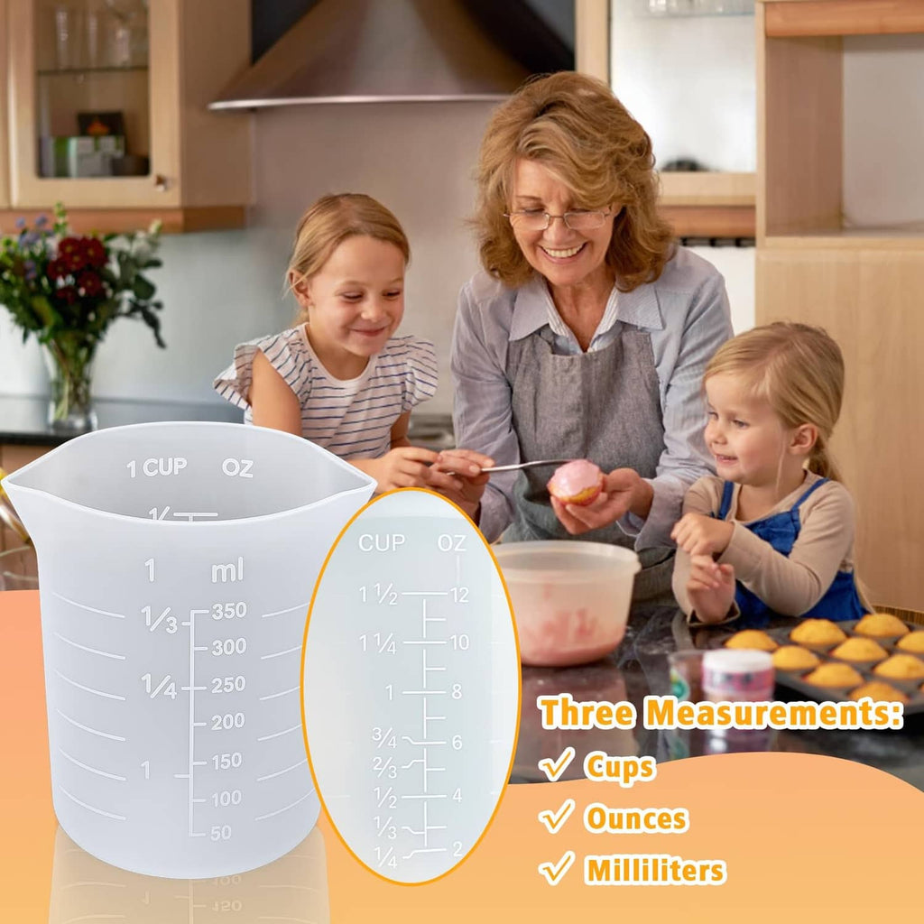 White silicone measuring cup with ml and cup measurement scale for melting chocolate