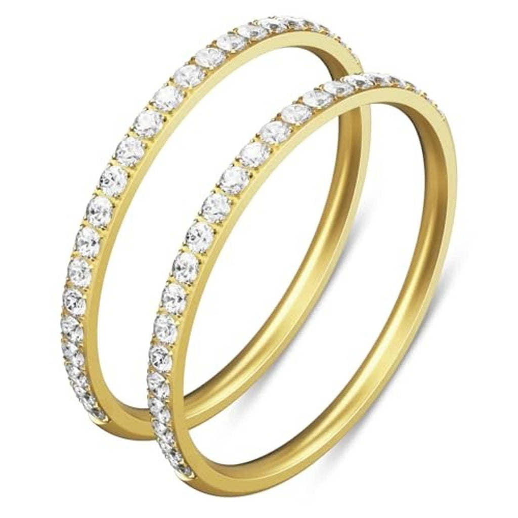 Pair of gold stackable Oura ring bands with clear stones