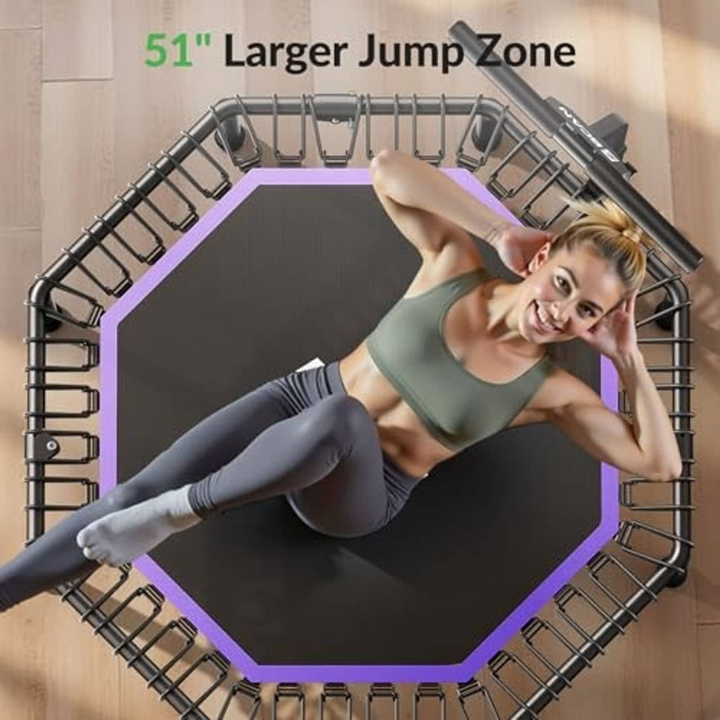 Octagonal rebounder trampoline with purple border and black spring deck indoors