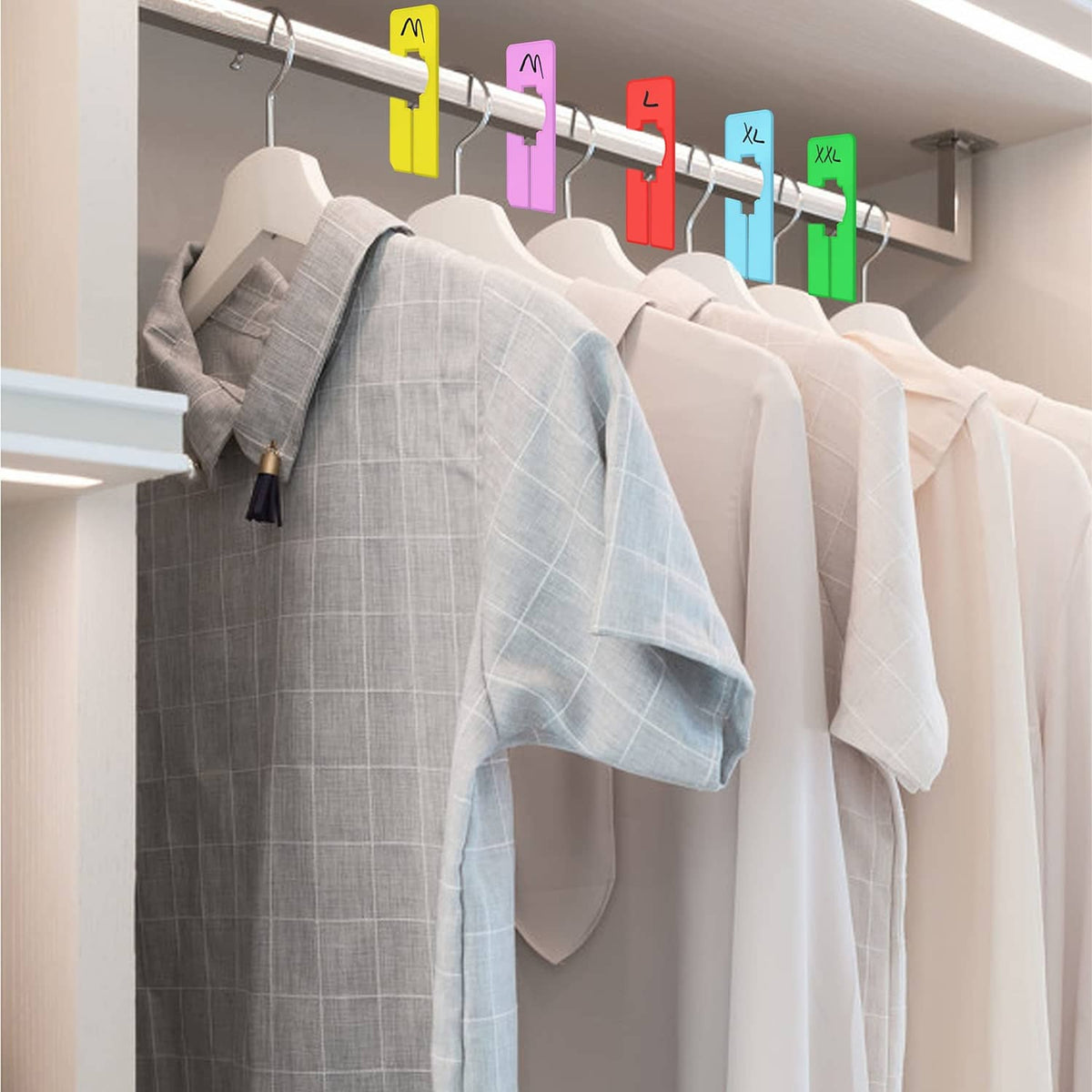 Closet rod organizer with colorful rack dividers separating hanging shirts